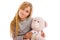 Blond girl with teddy bear thermometer and flu