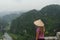 Blond hair woman and breathtaking panoramic view over the Tam Coc Valley