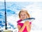 Blond kid girl fishing tuna little tunny happy with catch