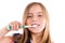 Blond kid indented girl cleaning teeth toothbrush