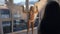 Blond model in lingerie posing as angel ins studio near large window