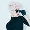 blond model in vintage glasses with stylish haircut. fashion photo