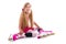 Blond pigtails roller skate girl sitting happy