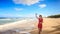 Blond Slim Girl Runs along Beach Makes Selfie in Red Barefoot