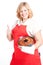 blond woman with bundt cake and red apron