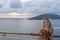 Blond woman on cruise ship with sunset view in Philipsburg, St M