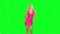 Blond woman dancing, on chroma green background