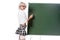 blond woman in seductive school uniform and stockings writing on empty chalkboard