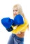 blond woman wearing boxing gloves