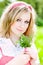 Blonde beautiful girl portrait with flowers