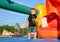 Blonde boy (7-9 years) in bouncy castle
