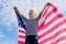 Blonde boy waving national USA flag outdoors over blue sky at summer - american flag, country, patriotism, independence