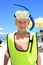 Blonde boy wearing snorkel gear at the beach
