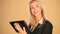 Blonde businesswoman on a tablet