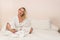 Blonde cell copyspace spa beauty bed female bathrobe hotel bathroom, concept unrecognizable modern from wellness and