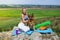 Blonde girl practices yoga with dogs, german shepherd