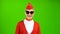 Blonde girl in a red suit is walking in sunglasses. Green Screen