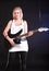 Blonde girl with rock guitar