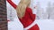 Blonde girl in Santa Claus costume back view 4K