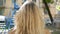 Blonde hair female head back view outdoor