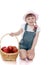 Blonde little girl with short braids in pink hats