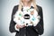 A blonde manager is holding a cloud with \'SEO\' optimisation flowchart.