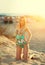blonde in One Piece Swimsuits. in the rays of a bright sun. Vintage color tone
