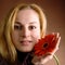 Blonde with a red flower