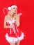 Blonde Santa girl blowing kiss