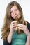 Blonde teenage girl playing the flute