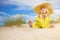 Blonde wearing sun hat at the beach