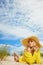 Blonde wearing sun hat at the beach