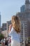 Blonde woman in blue shirt posing in Boston