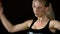 Blonde woman dances go-go Training Wet sweat Spotted Separate movements Slowmotion black background