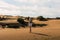 Blonde woman in dunes desert in a sunny day