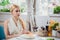 Blonde woman having lunch at the restautant