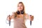 Blonde woman holding skipping rope wearing headphones