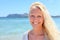 Blonde woman portrait outdoors on beach