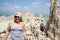 Blonde woman poses near the tufa towers of Mono Lake California