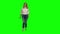 Blonde woman is running then stoped on green screen. Chroma key, 4k shot. Front view.