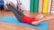 Blonde woman working on exercise mat