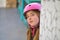 Blonk kid skate girl helmet portrait smiling