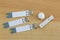 Blood Glucose test strip with lancets, lancing pen device on woo