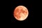Blood Moon. Lunar eclipse. Super bright full moon with dark background. Madrid, Spain, Europe
