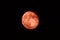 Blood Moon. Lunar eclipse. Super bright full moon with dark background. Madrid, Spain, Europe