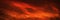 Blood red sky with clouds. Fiery sunset background with copy space for design. Web banner. Website header.