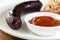 Blood sausage with ketchup