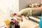 Blood test at a medical clinic. Nurse hands in yellow latex gloves holding a test tube in a rack with other samples