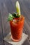 Bloody mary cocktail garnished with celery, popular alcohol drink