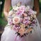 a blooming bouquet in the hands of a joyful bride, Generative AI